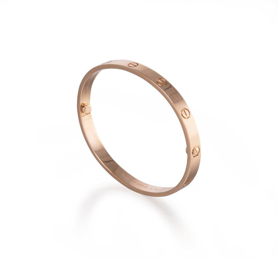 18ct Rose Gold Cartier Love Bracelet upright on a white background