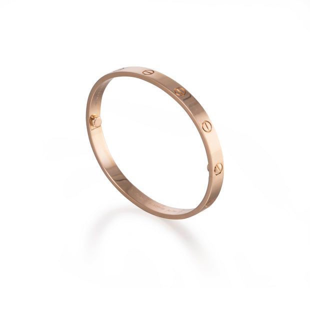 18ct Rose Gold Cartier Love Bracelet upright on a white background