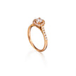Rose Gold ring with a diamond on a white background