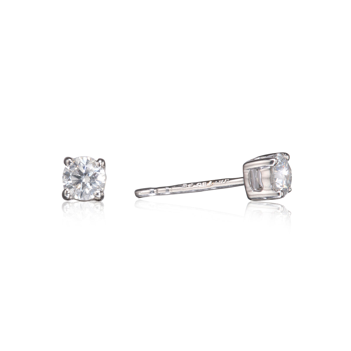 18ct White Gold 4-Claw Diamond Solitaire Stud Earrings close up on white background
