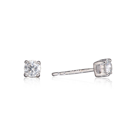 18ct White Gold 4-Claw Diamond Solitaire Stud Earrings close up on white background