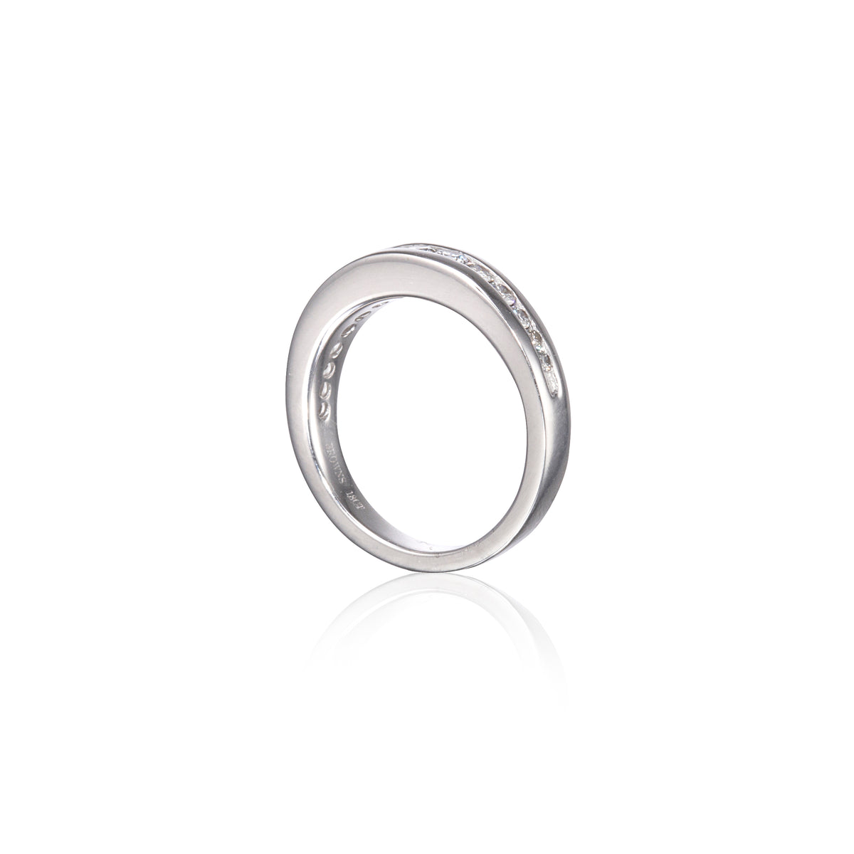 A polished white gold band ring with a row of small clear stones set along the outer edge, shown on a clean white background with a soft reflection below.