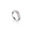 A white gold band ring featuring a channel-set row of clear round gemstones along the upper half, shown on a clean white background with a soft reflection.