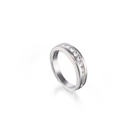 A white gold band ring featuring a channel-set row of clear round gemstones along the upper half, shown on a clean white background with a soft reflection.