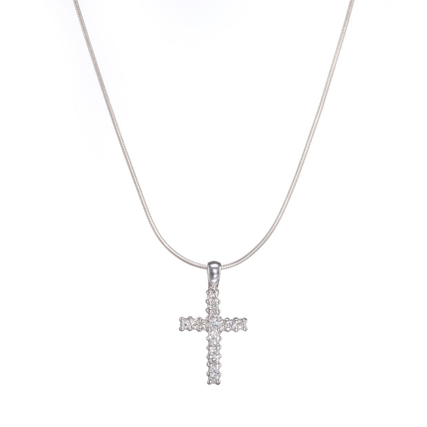 White gold cross pendant necklace on a white background