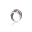 A white gold multi-band ring with rows of small clear stones, shown on a clean white background with a soft reflection below.