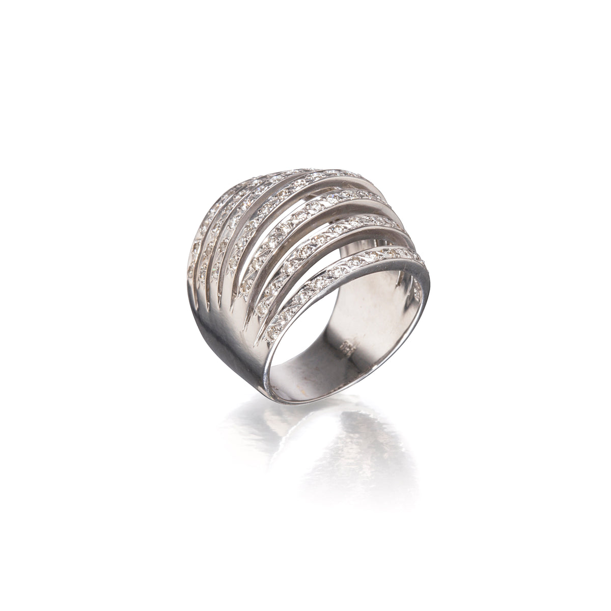 A white gold wrap-around ring with multiple horizontal bands of small clear stones, photographed on a clean white background with a soft reflection below.