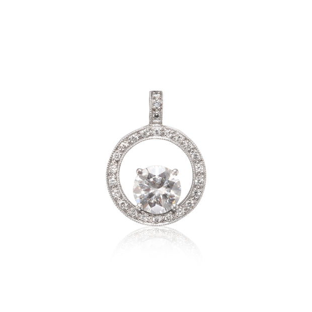 Pendant with a clear gemstone on a white background