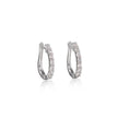 Pair of white gold hoop earrings with clear stones on a white background