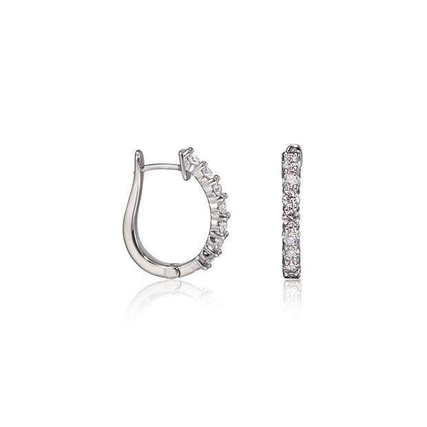 White gold hoop earrings with embedded stones on a white background