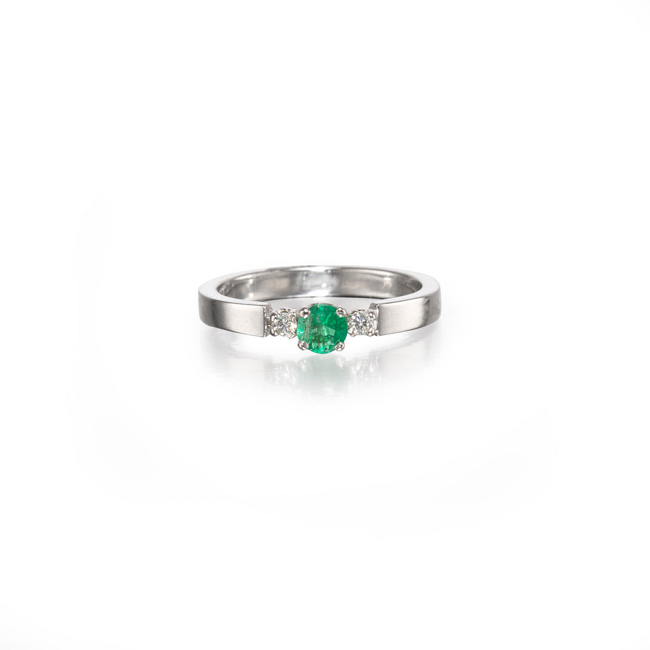18ct White Gold Emerald and Diamond Ring on white background