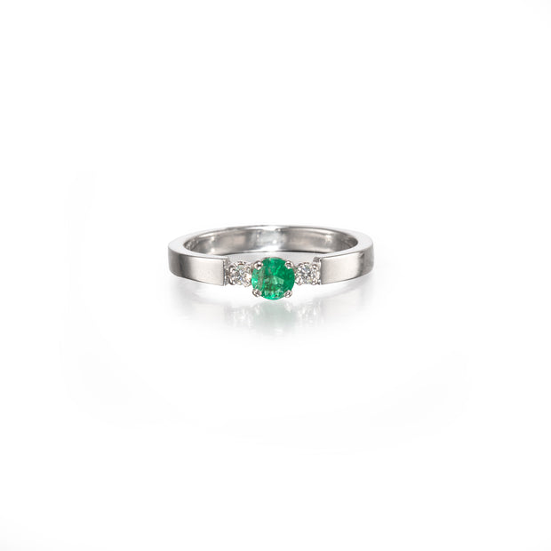 18ct White Gold Emerald and Diamond Ring on white background
