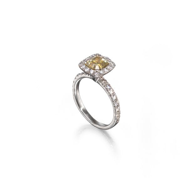 18ct White Gold Fancy Yellow Diamond Halo Ring side view on white background
