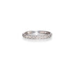 A thin white gold band ring paved with small clear round stones, centered on a clean white background with a soft reflection below.