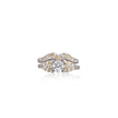 Two diamond rings with yellow and white stones on a white background