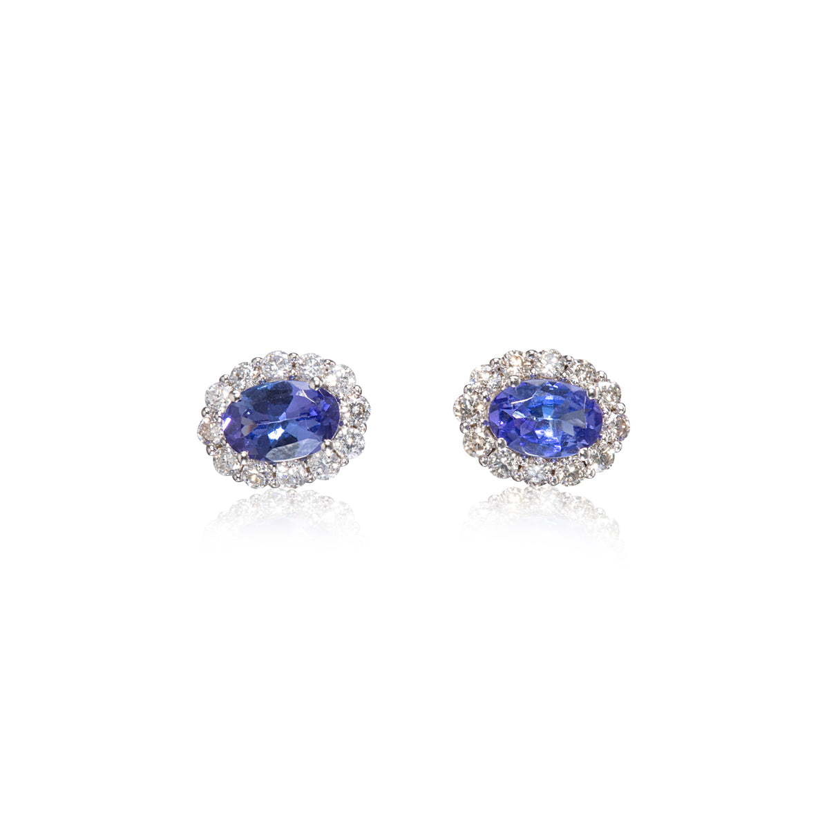 18ct white gold oval cut tanzanite and diamond halo earrings
