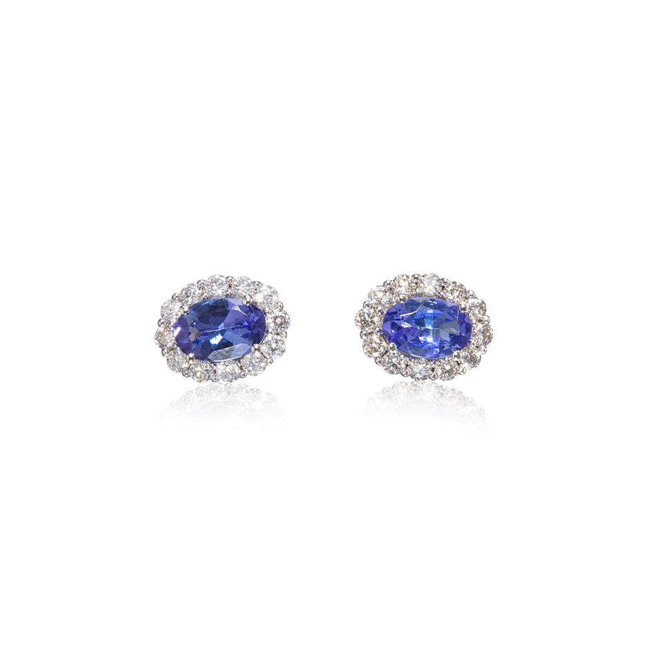 18ct white gold oval cut tanzanite and diamond halo earrings