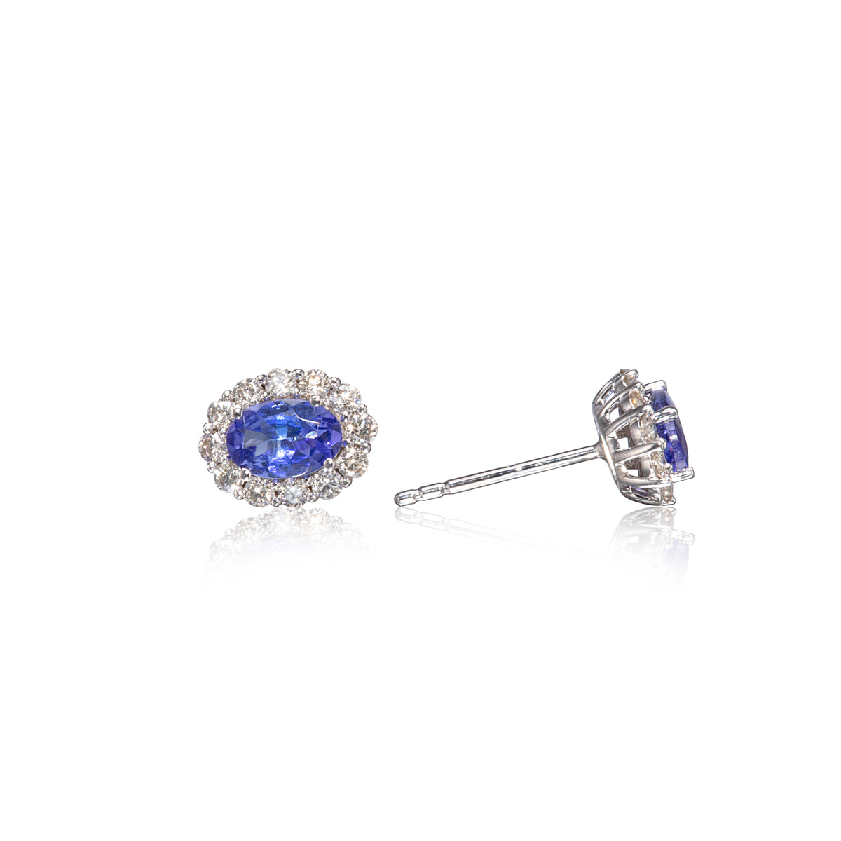 18ct White Gold Oval Cut Tanzanite and Diamond Halo Earrings close up