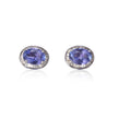 White Gold earrings with clear gemstones on a white background