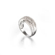 A white gold ring featuring a curved, double-row pavé setting of clear stones, shown on a clean white background with a soft reflection below.