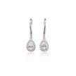 Pair of white gold teardrop earrings with clear stones on a white background