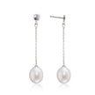 Pearl earrings with silver chains on a white background