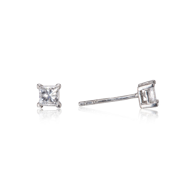 Pair of diamond stud earrings on a white background