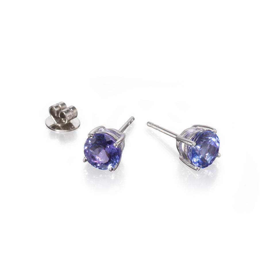 18ct White Gold Tanzanite Earrings with butterfly on white background
