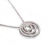 A white gold spiral pendant necklace paved with small clear stones, shown on a white background.