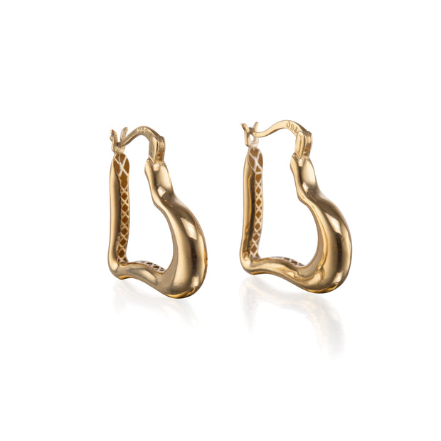 A pair of gold huggie hoop earrings with a textured, organic wavy design and a polished finish, displayed on a clean white background with a soft reflection.