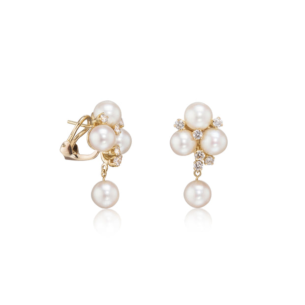 Pair of pearl earrings on a white background