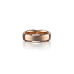 A polished rose gold band ring centered on a clean white background with a soft reflection underneath.