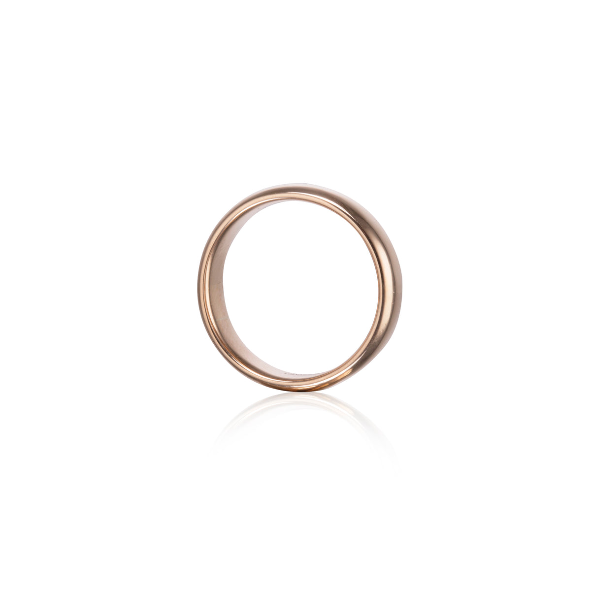 A minimalist rose gold band ring with a smooth, polished finish, shown on a clean white background with a soft reflection underneath.