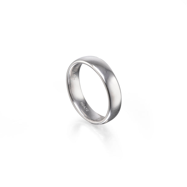White gold band on a white background