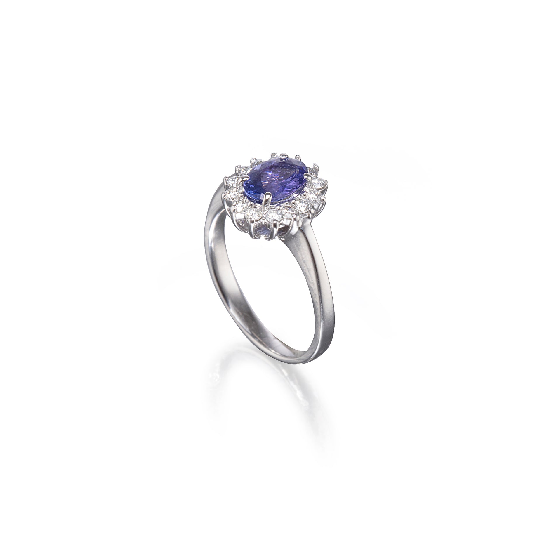 Browns 9ct White Gold Oval Tanzanite and Diamond Halo Ring - Miller ...