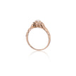 Gold ring with a diamond on a white background
