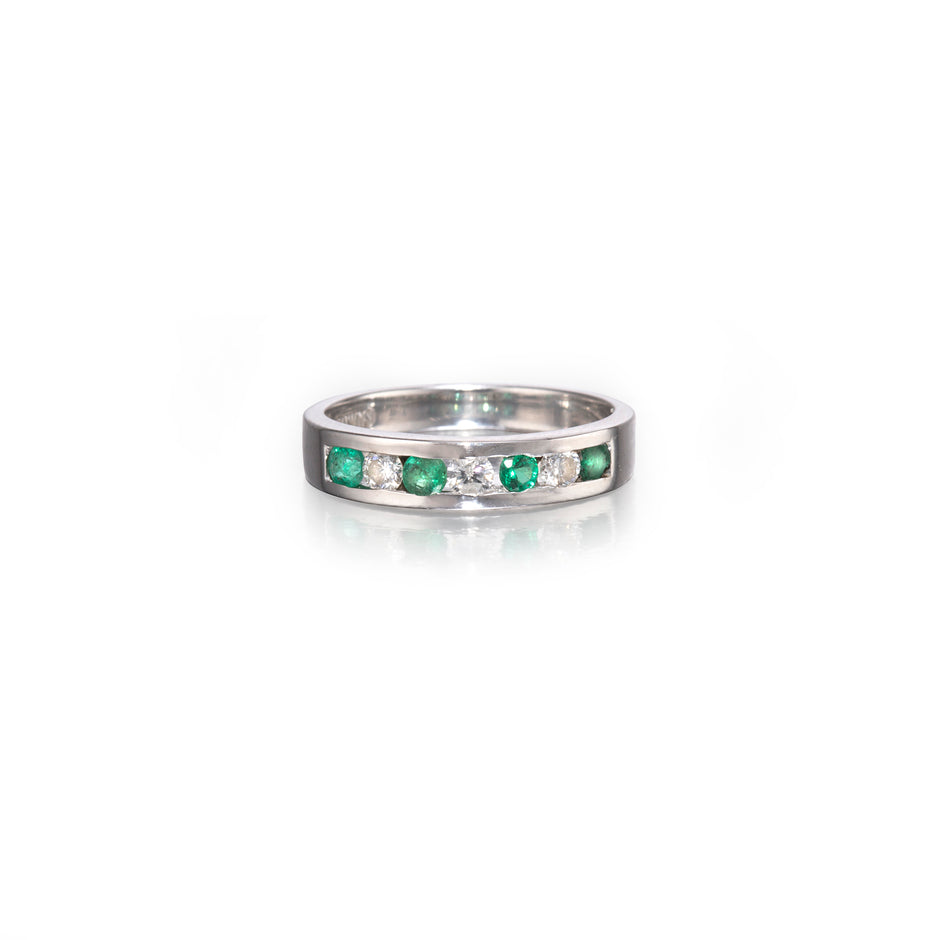 Browns 18ct White Gold Emerald and Diamond Channel Set Ring on white background