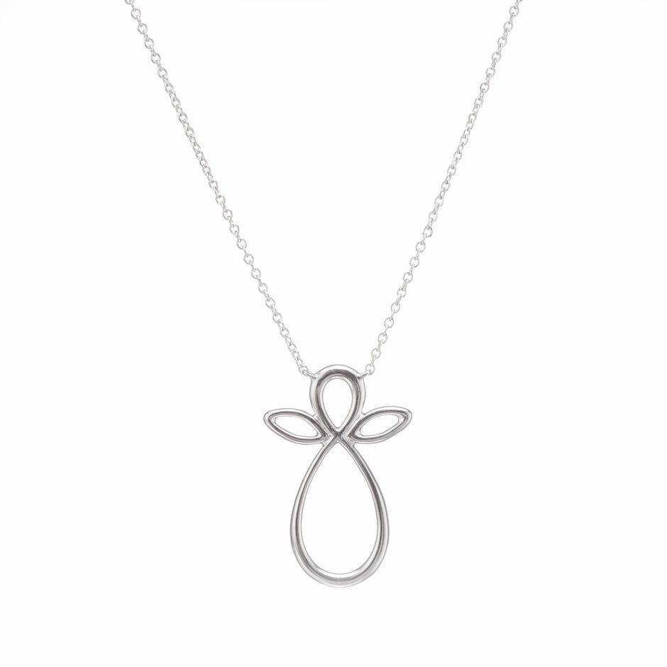 White gold cross-shaped pendant on a chain against a white background