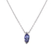 A White gold chain necklace with a marquise-cut purple gemstone pendant in a silver bezel setting, shown against a plain white background.