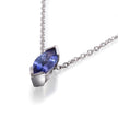 A white gold necklace featuring a marquise-cut blue gemstone pendant in a polished bezel setting, shown on a clean white background with a soft reflection.