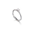 A platinum solitaire engagement ring with a round-cut diamond set in a four-prong setting, shown on a clean white background with a soft reflection.
