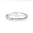 Platinum and rose gold diamond bracelet with clear stones on a white background