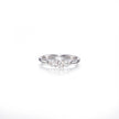 White gold ring with small diamonds on a white background