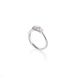 White gold ring with three diamonds on a white background
