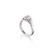 White gold ring with a diamond on a white background