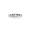 A white gold diamond eternity ring with a continuous row of round-cut diamonds on a plain white background