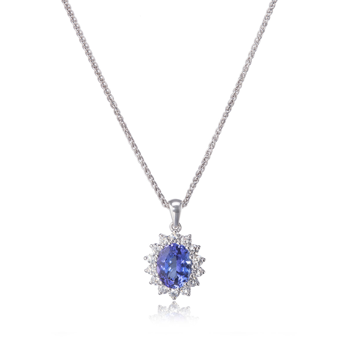Browns 18ct White Gold Cluster Tanzanite and Diamond Pendant with a 18ct White Gold Chain