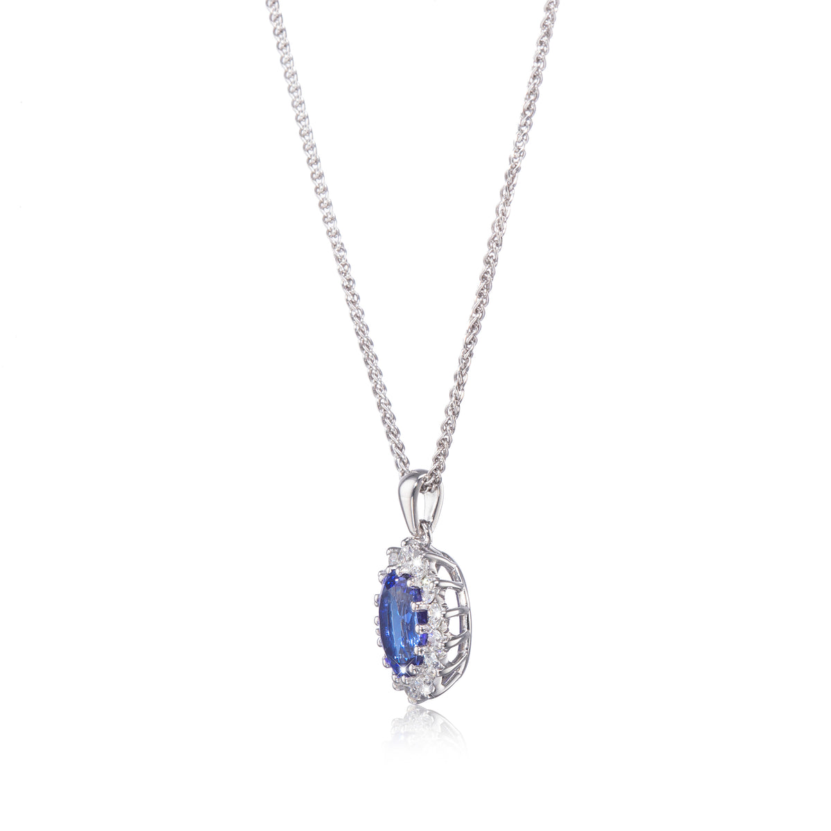 Browns 18ct White Gold Cluster Tanzanite and Diamond Pendant with a 18ct White Gold Chain