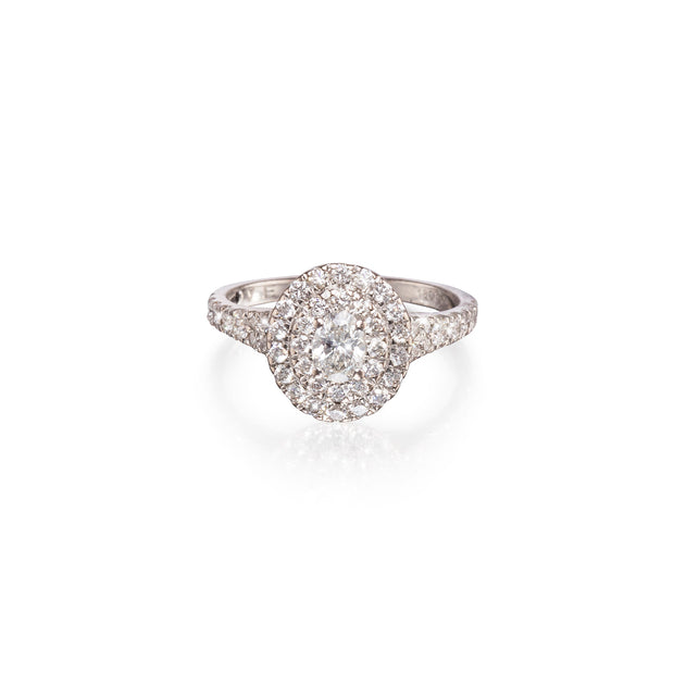 18ct white gold Diamond Halo Ring with oval centre diamond, available in South Africa