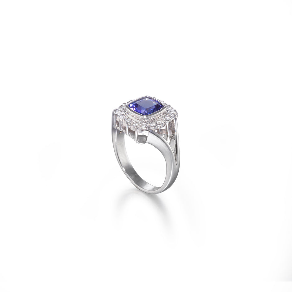 18ct White Gold Cushion Cut Tanzanite and Diamond Halo Ring